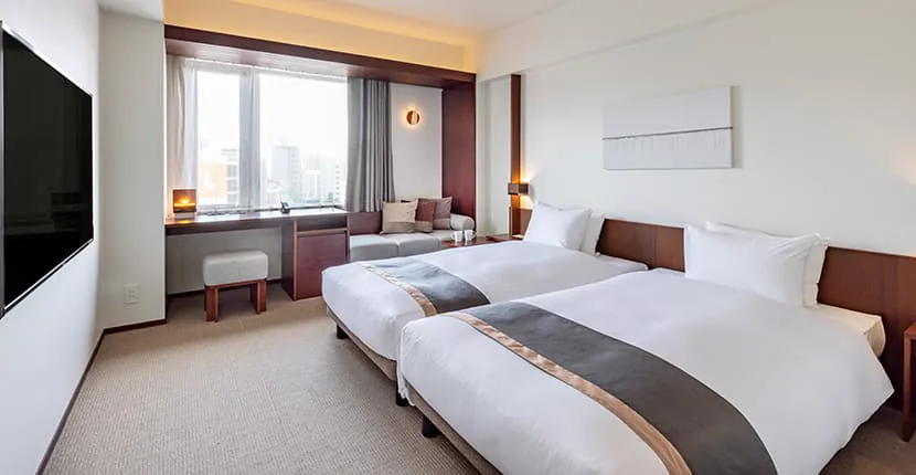 โรงแรม Tokyu STAY ฟุกุโอกะเท็นจิน คอมฟอร์ท ทวิน ห้องพักเตียงคู่พร้อมเครื่องซักผ้าและอบผ้าในห้อง สำหรับกลุ่มเพื่อนสนิทที่ฟุกุโอกะ