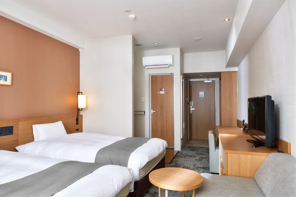 ห้องพักและพื้นที่เตียงของ Vessel Hotel Campana Okinawa