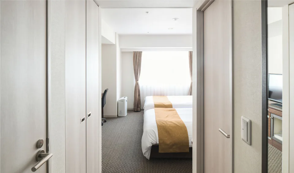 ห้องพักและพื้นที่เตียงของ Vessel Inn Sapporo Nakajima Park