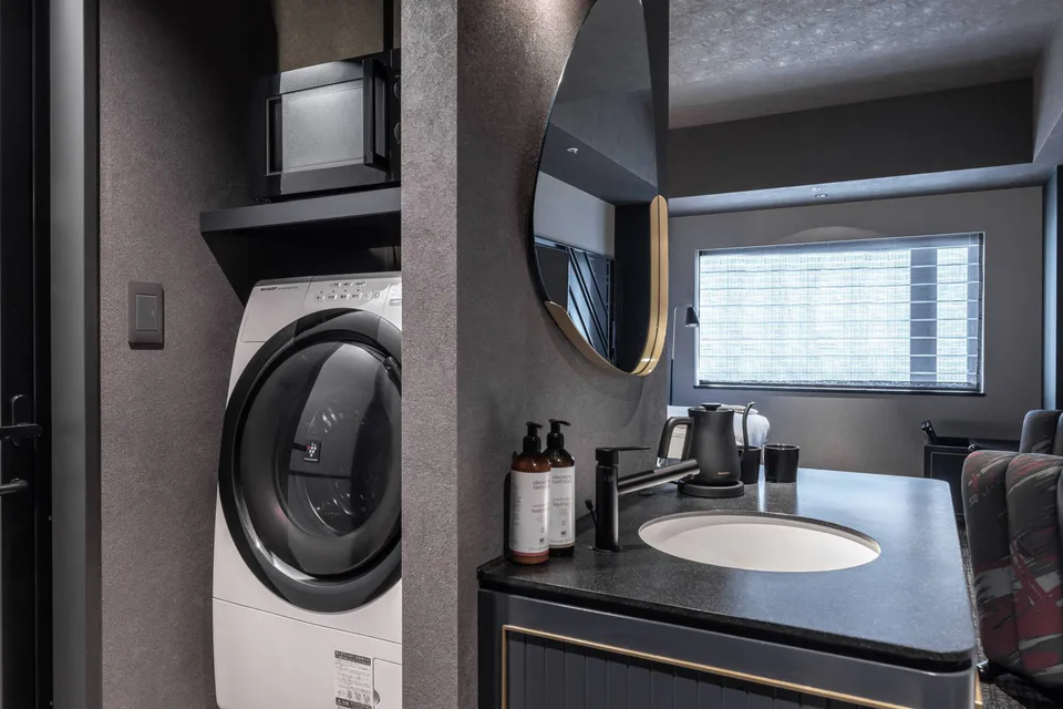 ห้องดีลักซ์ทวินพร้อมเครื่องซักผ้าอบแห้งในห้องที่ Mercure Tokyu Stay Osaka Namba